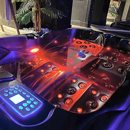 Отель La Grenoble Jacuzzi Et Sauna Privatif